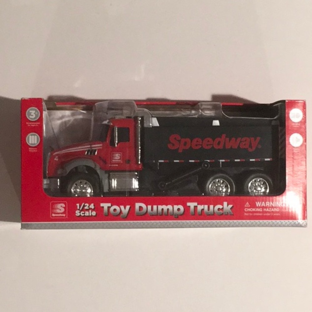 Speedway Mack Toy Dump Truck 1/24 scale, lights and sounds, New, never opened.